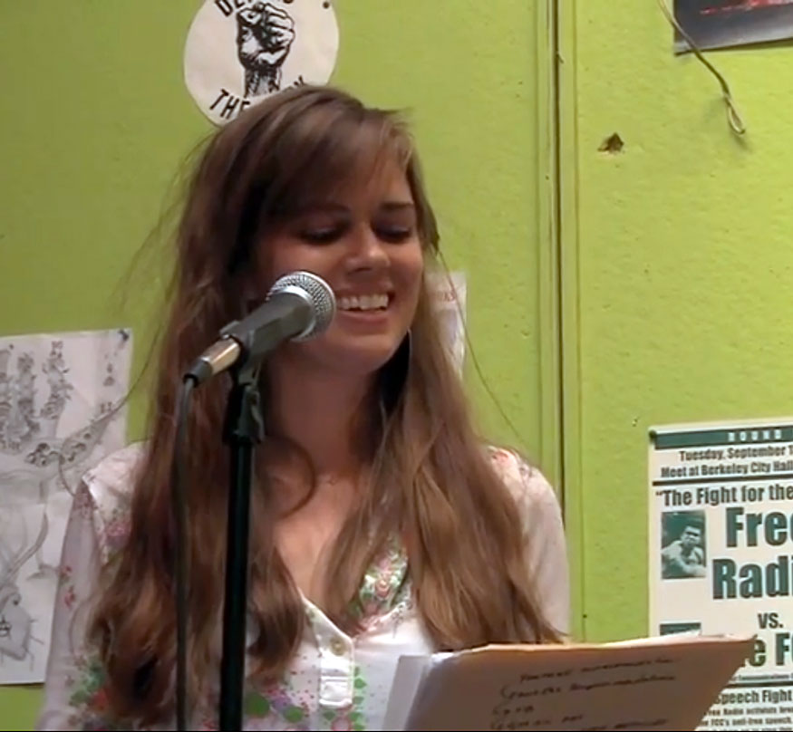 Katy Bohinc reading at an event in 2013