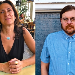 a poet, her hands clasped on the table, long brown hair, necklaces and v-neck shirt; another poet in blue button-up shirt before a blue wall, straight brown hair, short beard, and eyeglasses