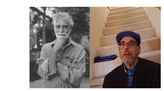 one man in grey hair and beard rests his chin on his fist; another is in closer focus, with close cropped hair, cap, and glasses, sits at the foot of a staircase looking out